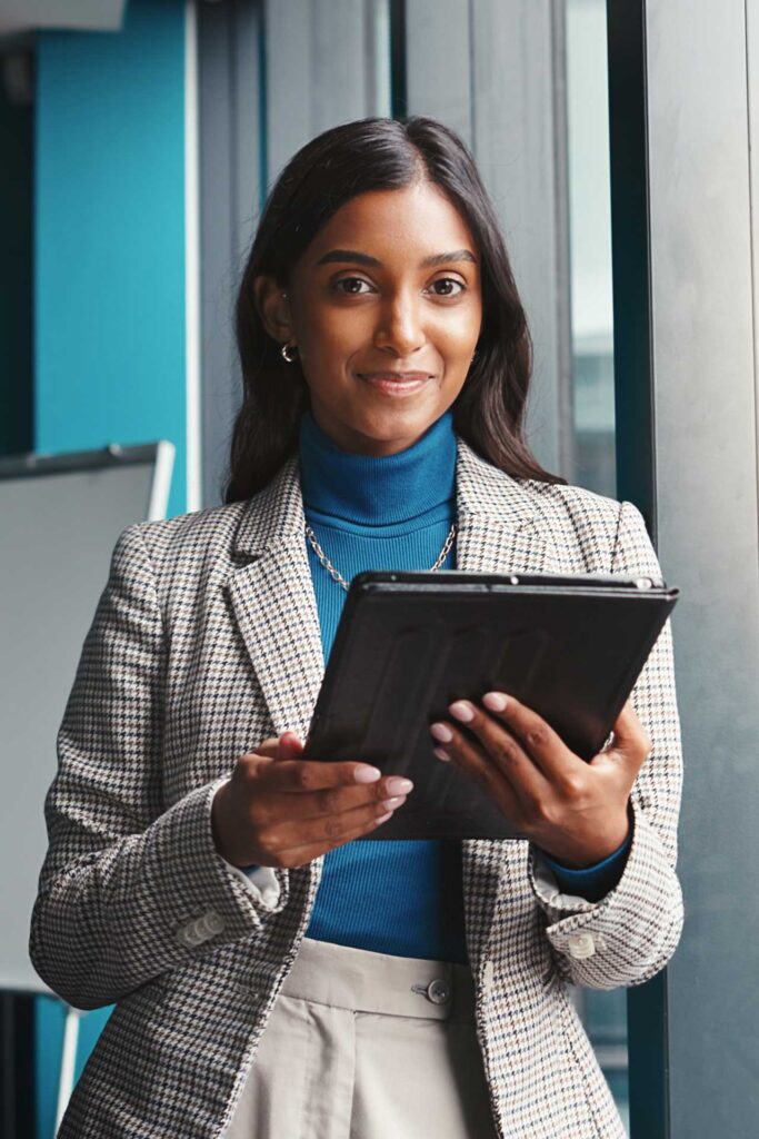 Woman executive holding a tablet