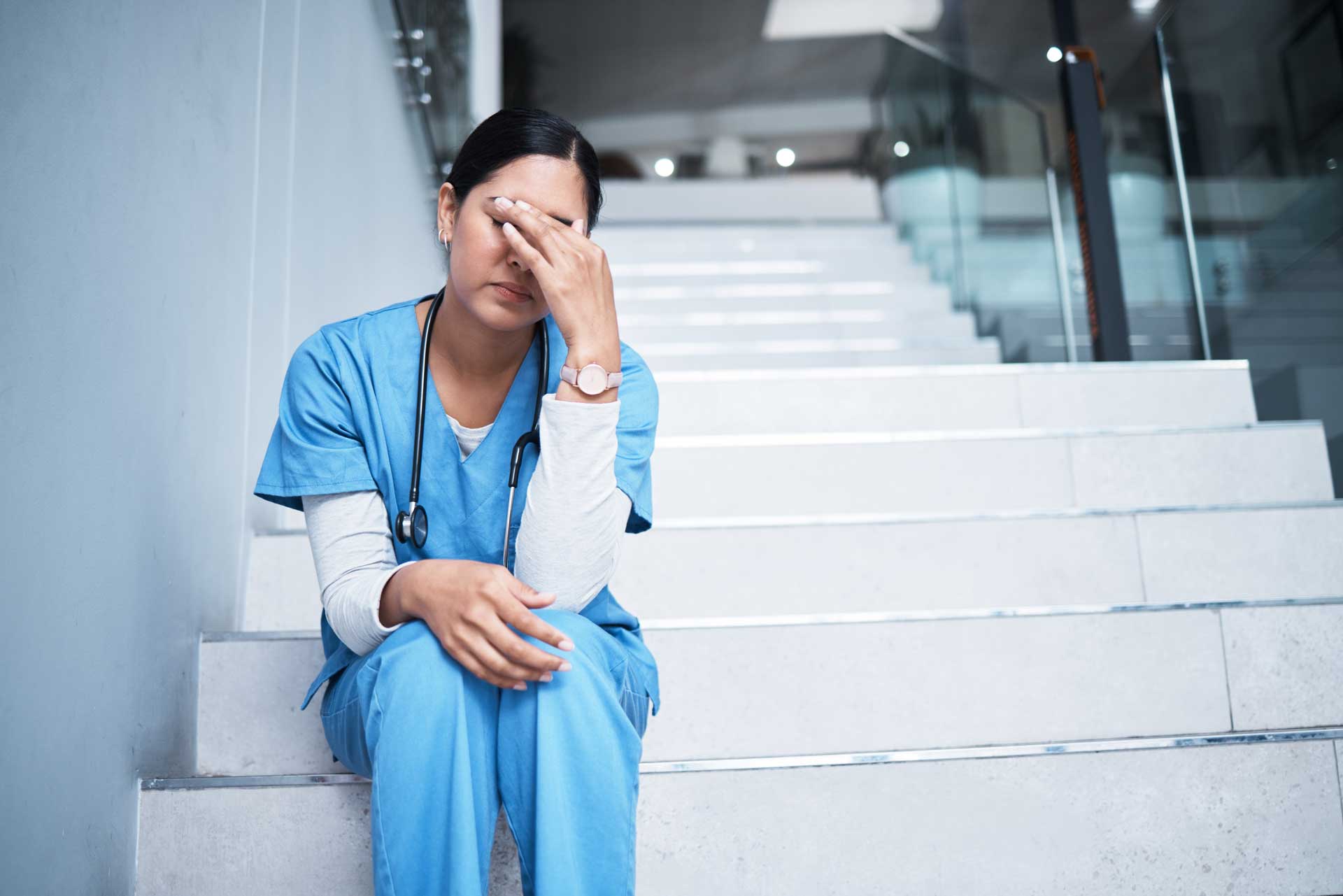 A nurse lookin like she's experiencing burnout
