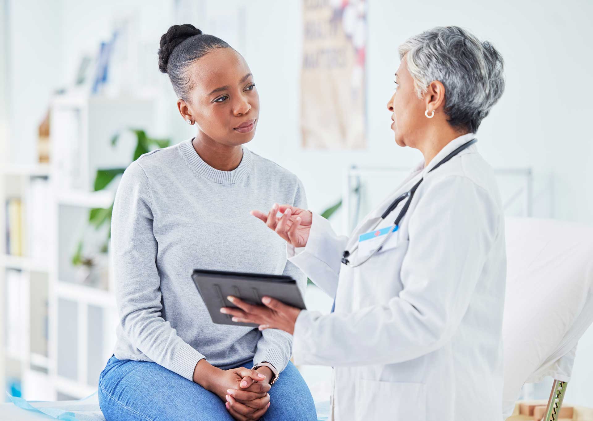 Physician talking with a patient